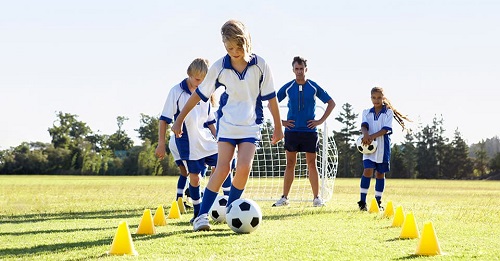 Children with hearing impairment play football