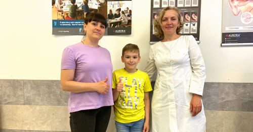 boy Bogdan from Volnovakha, deaf doctor Olena Serbin, humanitarian aid with hearing aids