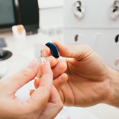 hearing aid in hands